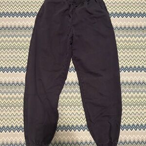 Black Sweatpants with Elastic Waistband and Tapered Legs